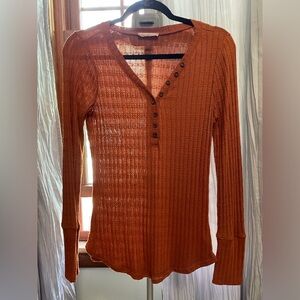 Rust colored long sleeve thermal, faux button top.